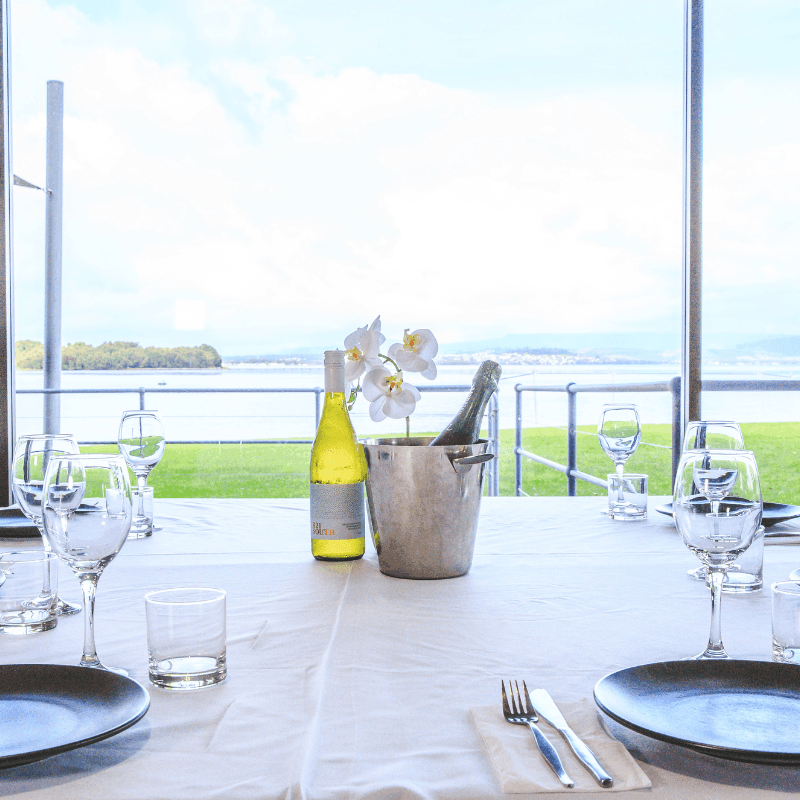 Table setting with wine and champagne at Illawarra Yacht Club