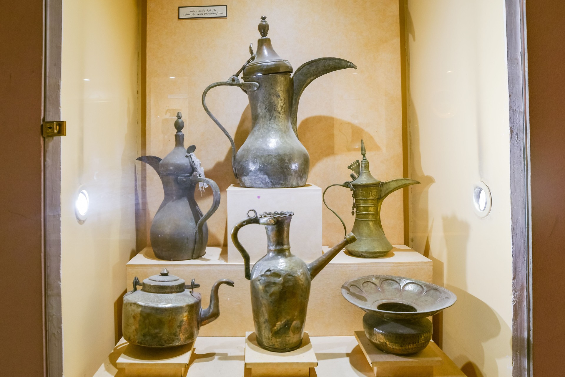 Abu dhabi, UAE - 27th april, 2025: traditional dallah coffee pot on display at a heritage museum, representing Arabic hospitality and the cultural rituals of coffee serving in the Gulf region