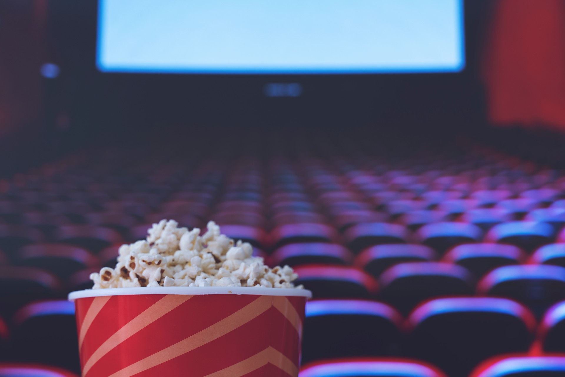 pop corn and on red armchair cinema