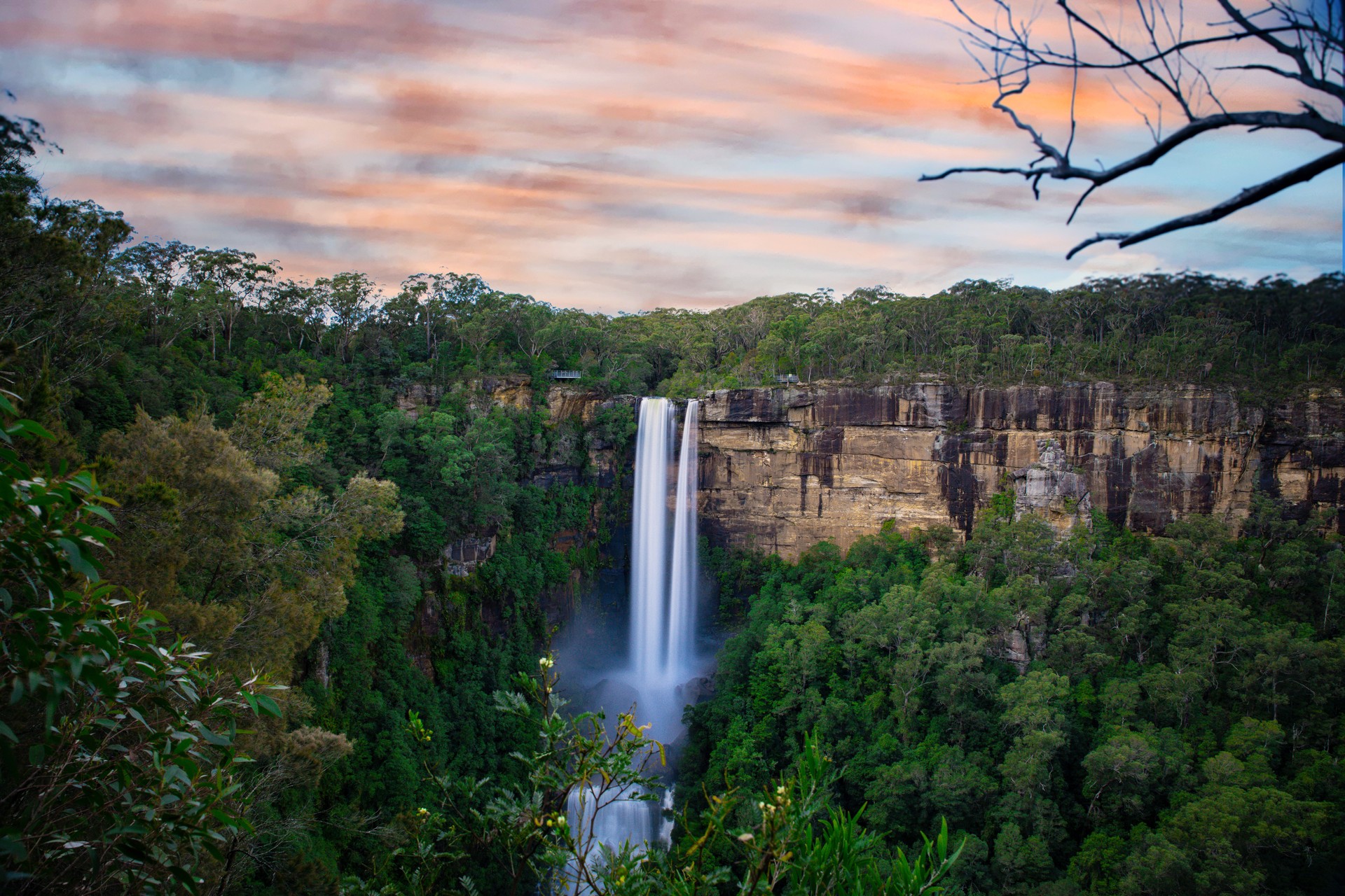 Beautiful flowing River in Fitzroy water Falls in Bowral NSW Australia beautiful colourful cloudy skies lovely waterfalls